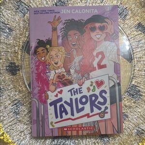 Scholastic The Taylors Book with Pink and Red Cover